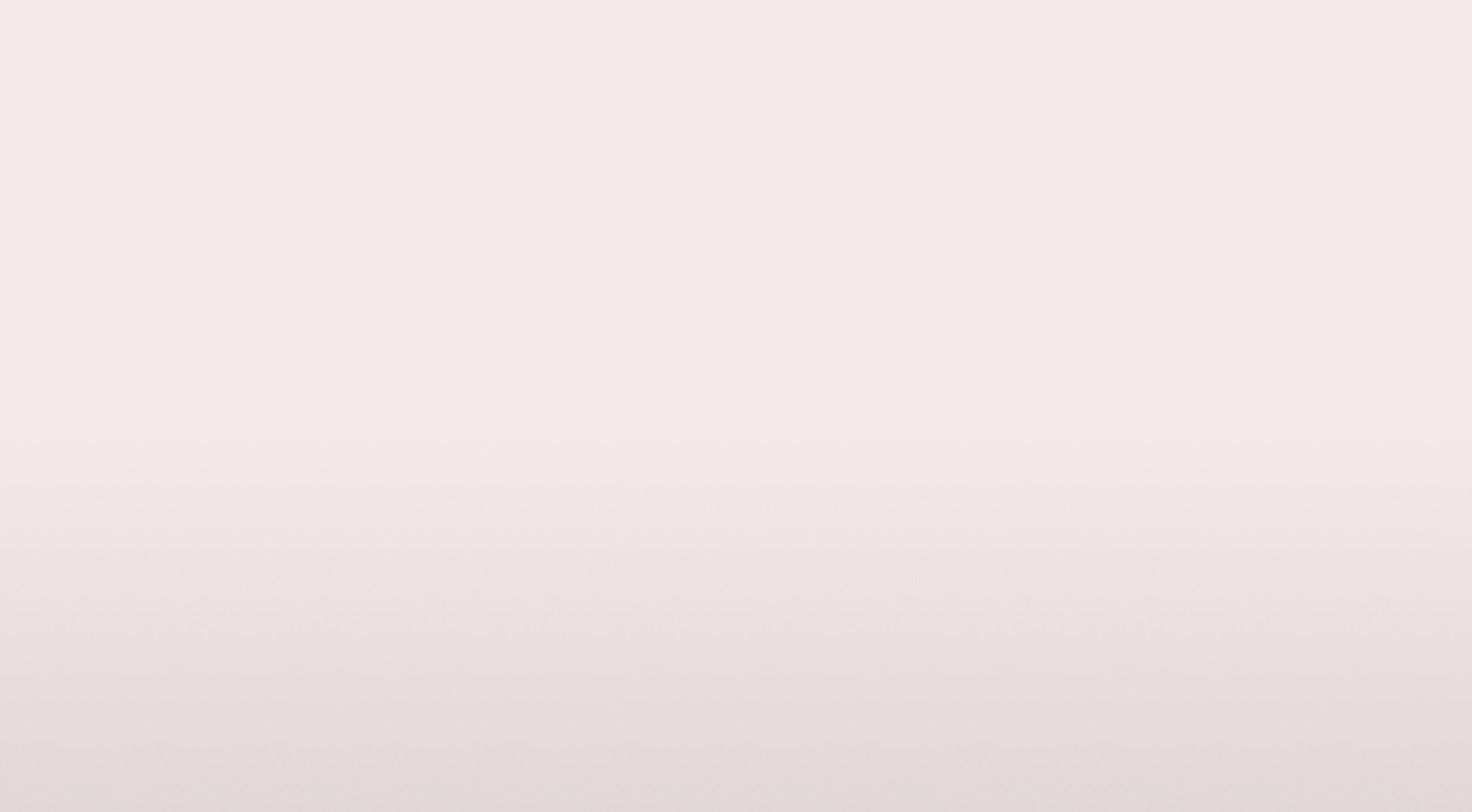 Soft pink gradient background.