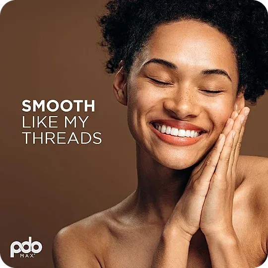Smiling woman promoting smooth skin products.