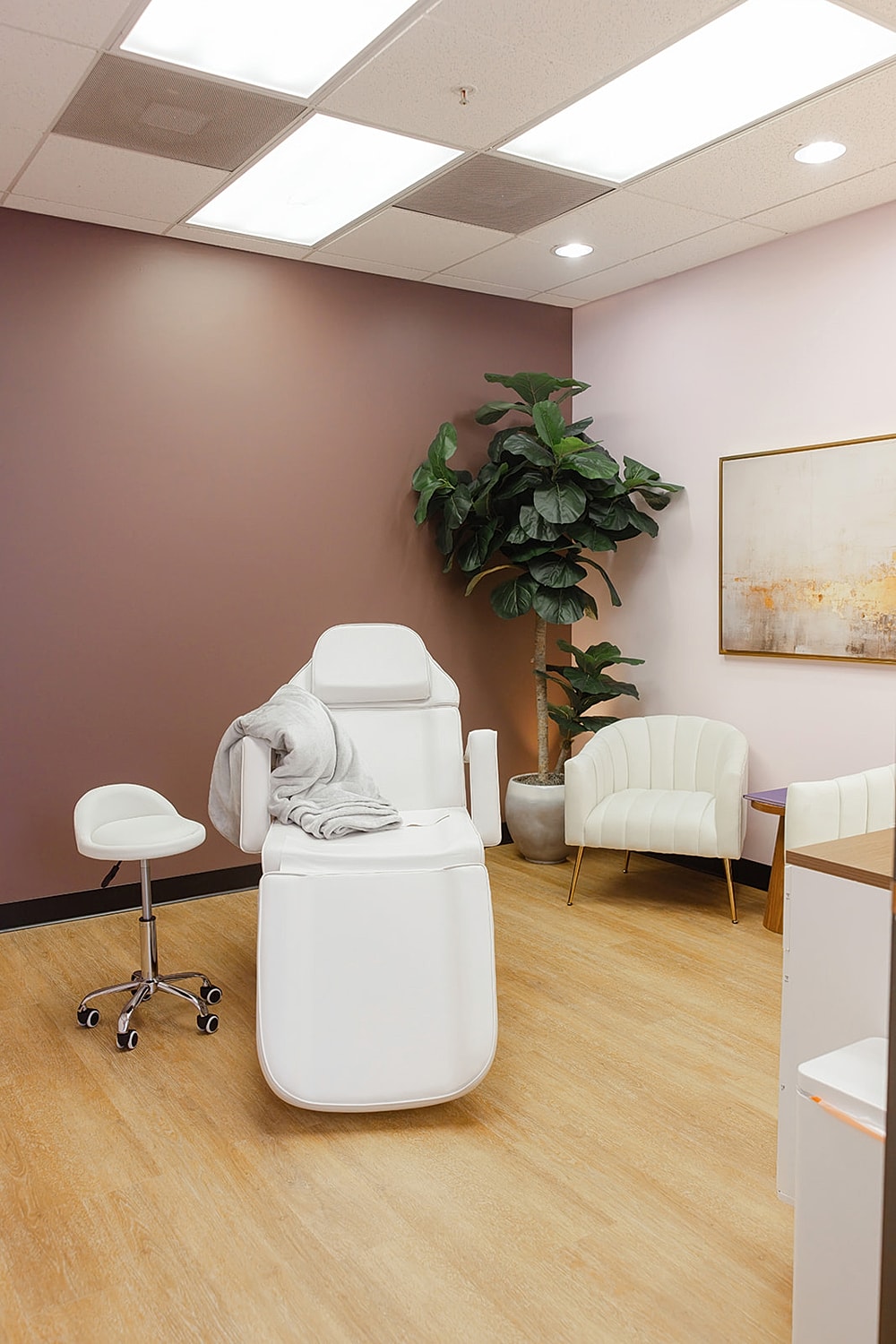 Relaxing treatment room with modern furnishings.